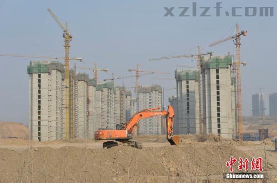 资料图：一处房地产项目破土动工。 <a target='_blank' href='http://www.chinanews.com/'>中新社</a>记者 韦亮 摄